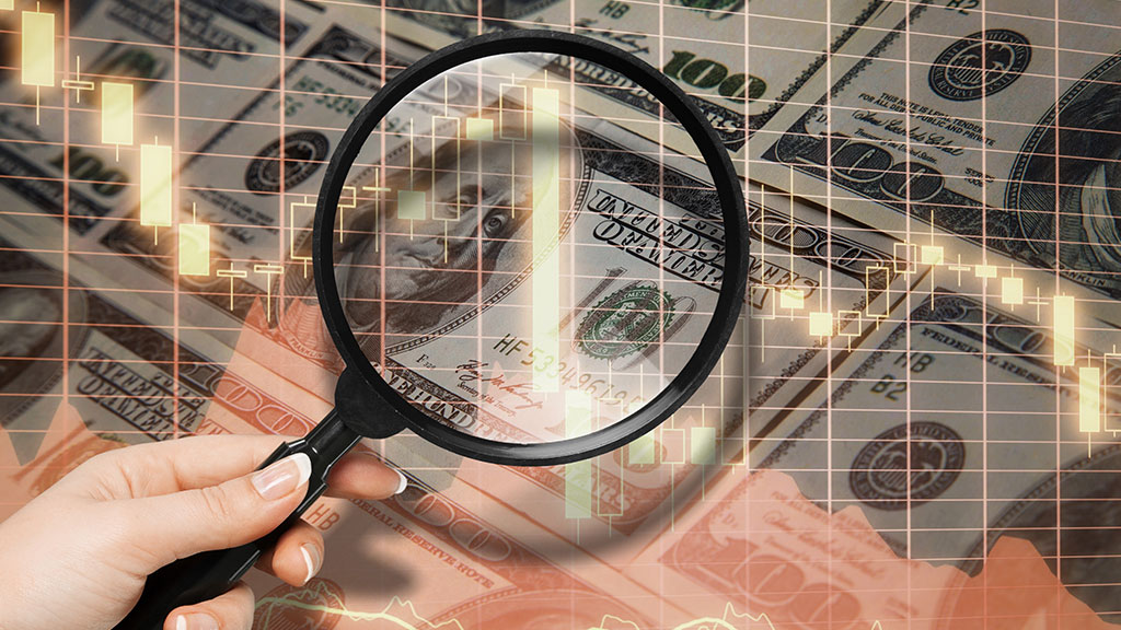 Lupe auf Dollarnoten